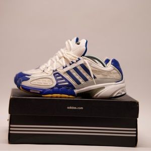 Blue and white Adidas volleyball shoes, worn once